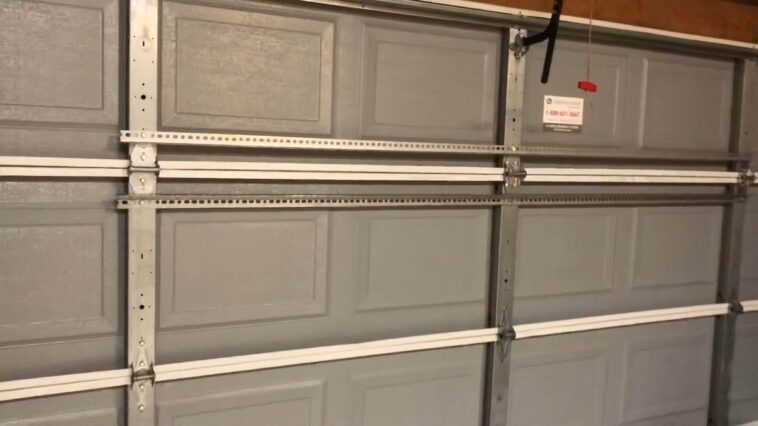 Quick easy and inexpensive fix for a buckling popping Garage door